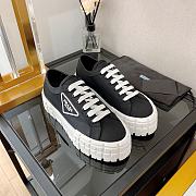 Prada double wheel low lop sneakers - 1